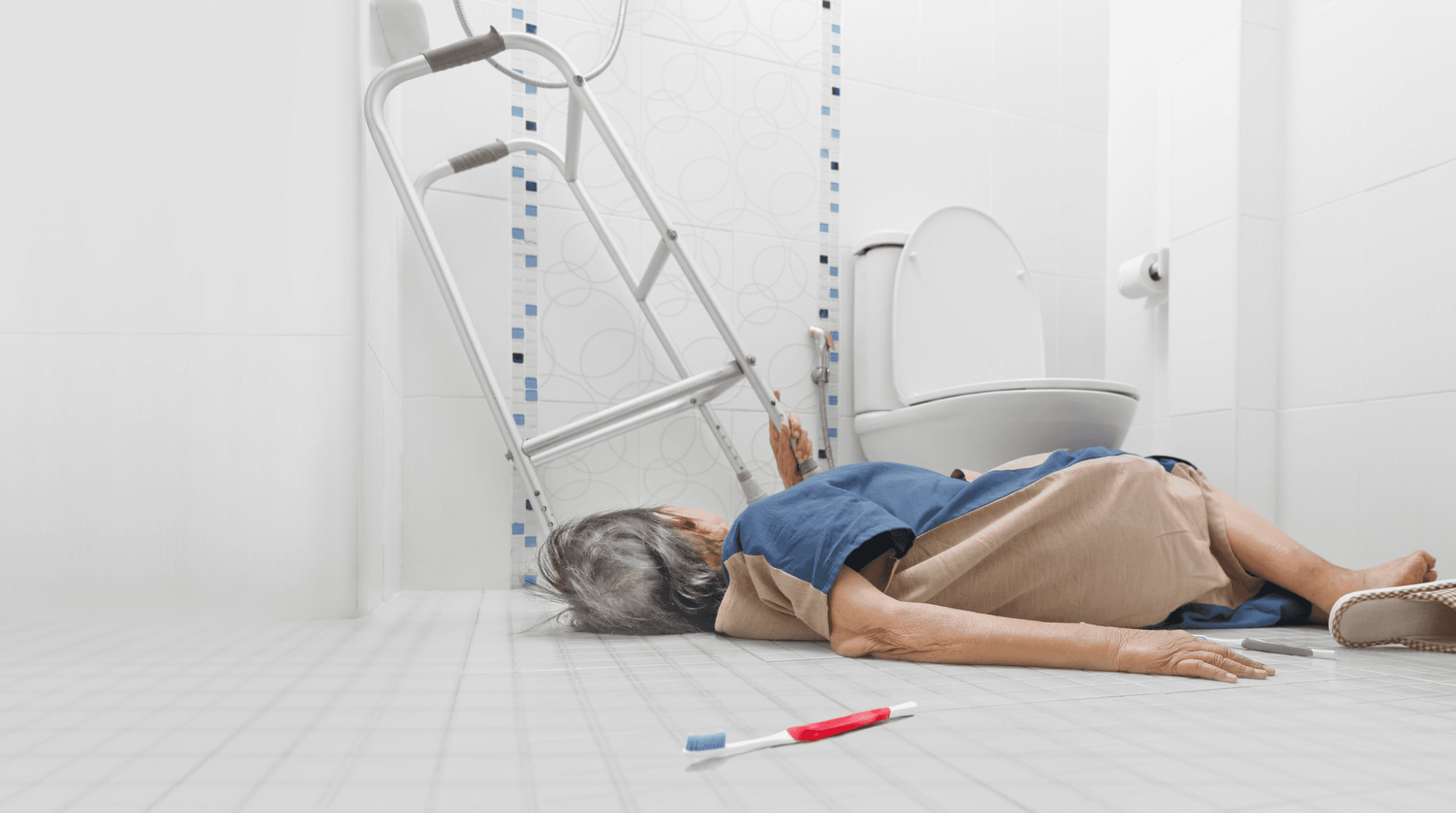Elderly person who has fallen in a bathroom — illustrating the real cost of falls among older Australians